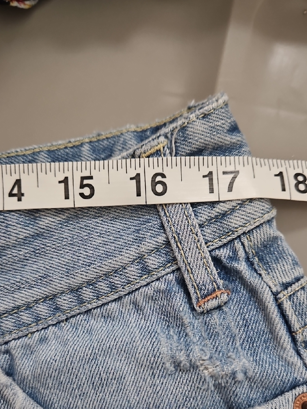 American Eagle | Y2K light denim shorts distressed flap-closure back pockets. 12 - Picture 11 of 13
